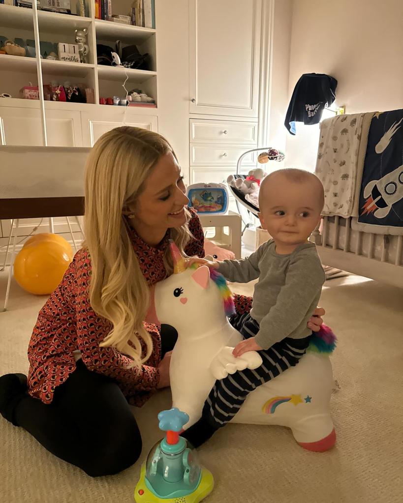 Paris Hilton playing with her son Phoenix