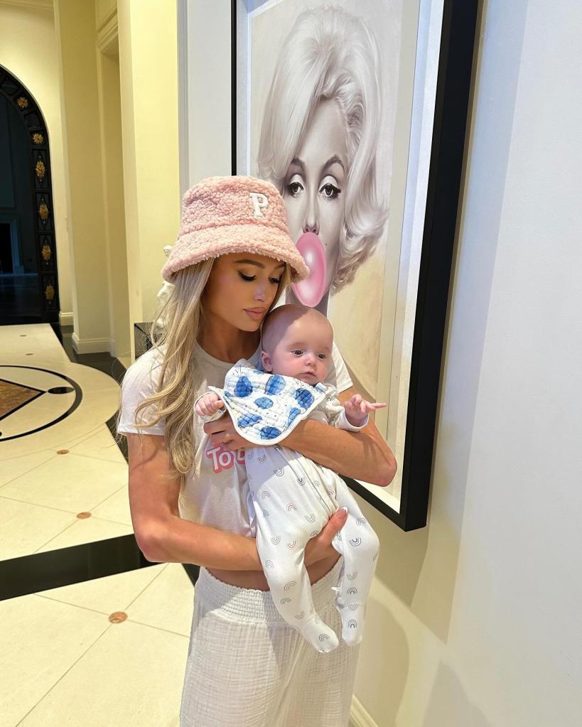 Paris Hilton holding her son Phoenix